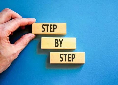Next step words symbol. Concept words Step by step on beautiful wooden bloc.. 写真素材