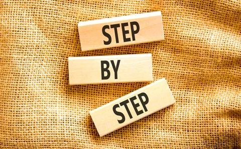 Next step words symbol. Concept words Step by step on beautiful wooden bloc.. 写真素材