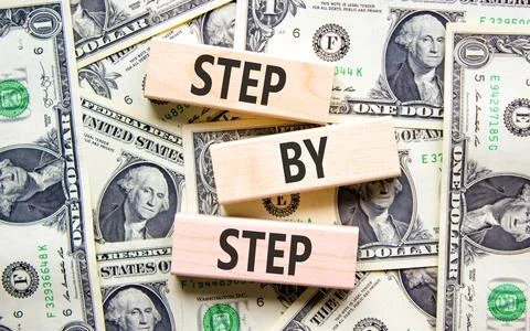Next step words symbol. Concept words Step by step on beautiful wooden blocks 写真素材
