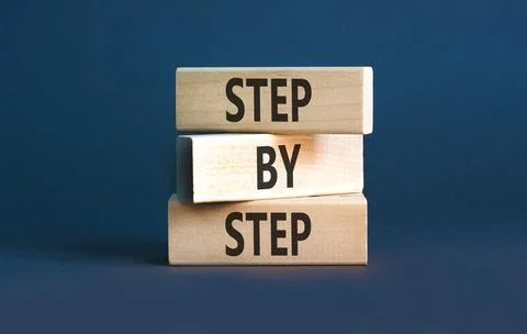 Next step words symbol. Concept words Step by step on beautiful wooden bloc.. 写真素材