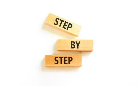Next step words symbol. Concept words Step by step on beautiful wooden bloc.. 写真素材