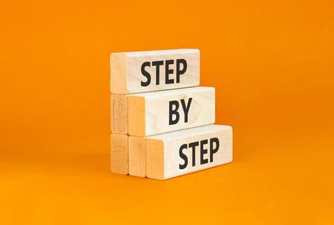 Next step words symbol. Concept words Step by step on beautiful wooden bloc.. 写真素材