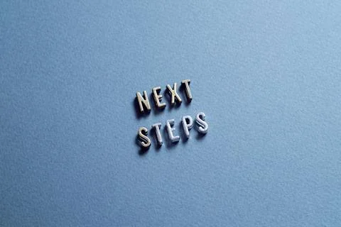 Next Steps - word concept on cubes, text Stock Photos