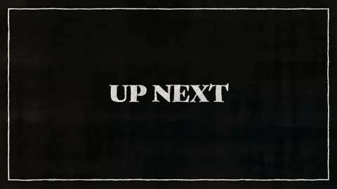 UP NEXT White Font On Black Paper Stock Footage 229997282