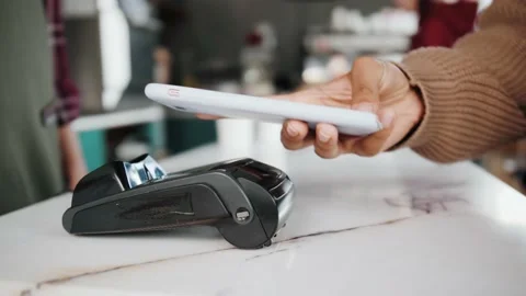 NFC banking technology. Close-up of young woman using credit card with NFC chip Stock Footage 139923025