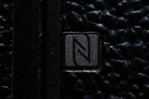 The NFC symbol is close on the camera. Old and dirty Stock Photos