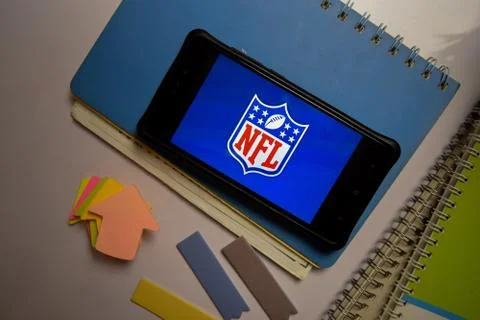 NFL App on Smartphone screen. Stock Photos