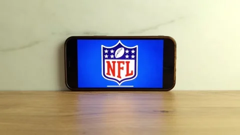 NFL logo displayed on mobile phone Stock Footage 243372174