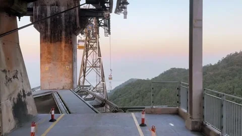 Ngong Ping Cable Car Passing Tower and 360 View under sunset sky Vídeos de archivo 287591991