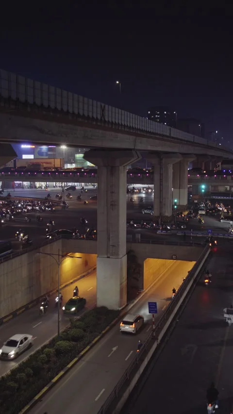 Nguyen Trai Underpass and Elevated Metro Viaduct at Night in Hanoi, Vietnam Stock Footage 344741729