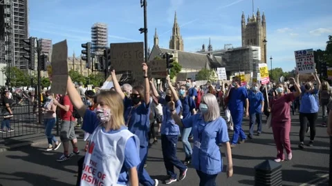 NHS nurses & key workers protest for a pay increase during Coronavirus pandemic. Stock Footage