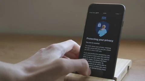 NHS Test and Trace App Stock-Footage 143482420