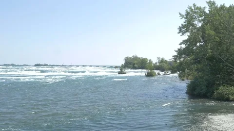 Niagara dam [during solar eclipse] pan Stock Footage 82733833