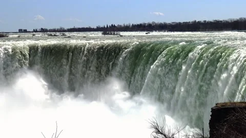 Niagara Falls, Canada, water falling against the sky Stock Footage 255230036