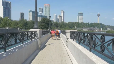Niagara falls [during solar eclipse] pedestrians Stock Footage 82735151