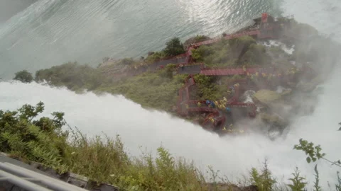 Niagara Falls pouring down on peope in Cave of the Winds Stock Footage 157550314