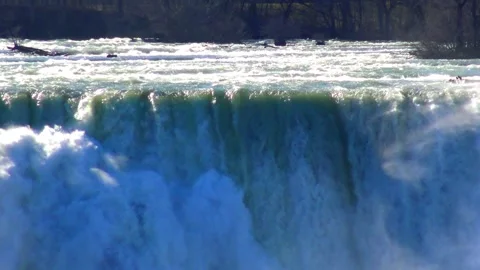 Niagara Falls viewed from the Canadian side, with the Rainbow Bridge connec.. Stock Footage 341692191