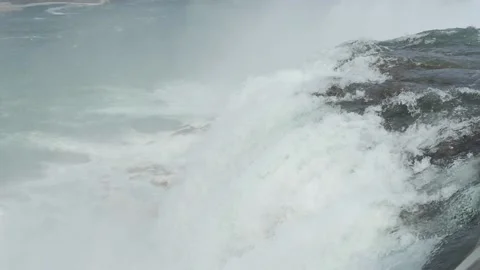 Niagara falls whitewater falling of the edge of cliff splashing water slow Video stock 151950441