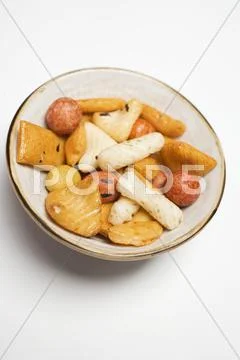 Nibbles from Japan in china bowl Stock Photos