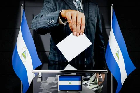 Nicaragua flags, hand dropping voting card - election concept Ilustración de archivo
