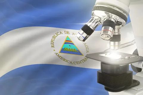 Nicaragua  science concept - microscope on flag Stock Illustration