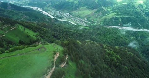Nice aerial view of the mountain plateau among the green forest Stock Footage 157240285