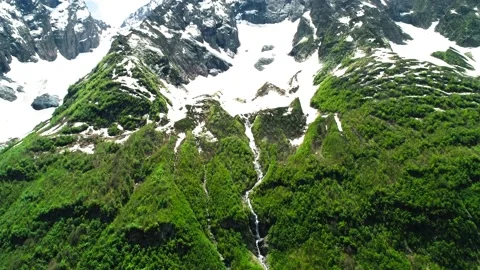 Nice aerial view of the mountain valley and high mountain slopes. 库存影片 157236956