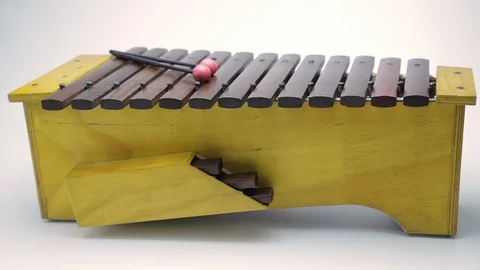Nice and clear footage side xylophone on the white background with dolly shot. Stock Footage 104640815