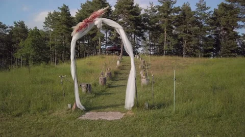 Nice and romantic view of a beautiful wedding arch in the mountain Stock Footage 134780234