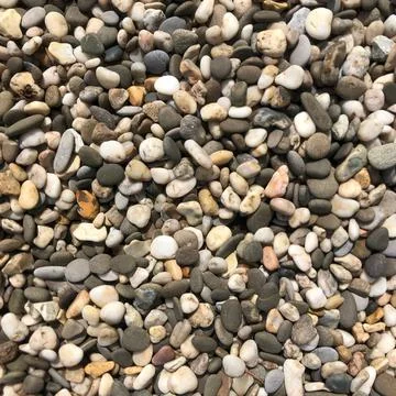 Nice background image of pebbles on a beach Stock Photos