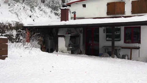 Nice backyard workroom in the mountains, with a lot of snow, 4K Stock Footage 71899014