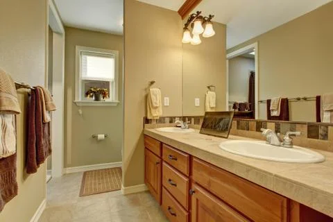 Nice bathroom with tile floor. Stock Photos