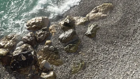 Nice Beach Shoreline Waves and Pebbles. (42 chars) Stock Footage 329584420
