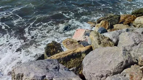 Nice Beach at Summer. Emerald Green Sea Water and Rocks on Coast. Stock Footage 243186252