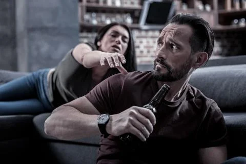 Nice bearded man holding his drink Stock Photos