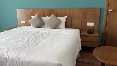 Nice big hotel room Bedside table sofa modern bedside table with an element of Stock Footage 310038724