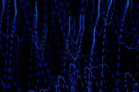Nice blue dotted lights as a background. Stock Photos