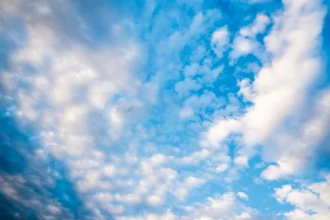 Nice blue sky with many small white clouds Stock Photos