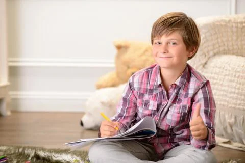 Nice boy drawing Stock Photos