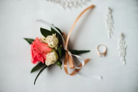 Nice button hole with wedding ring and jewelry Stock Photos