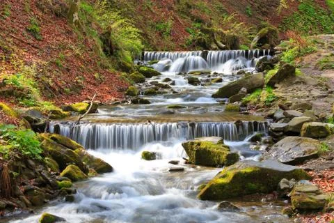 Nice cascade on mountain river Stock Photos