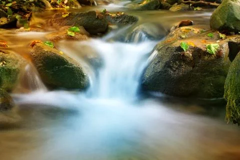 Nice cascade of mountain stream Stock Photos
