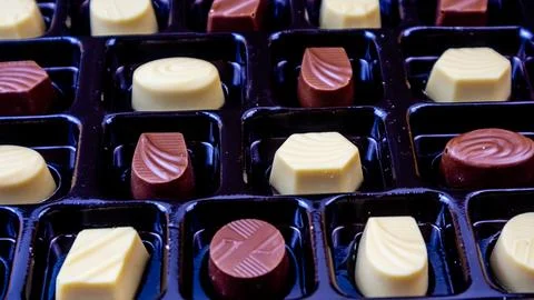 Nice chocolate on black background Stock Photos