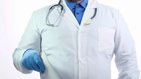 Nice chubby doctor with a beard in a white coat Stock Footage 118951700