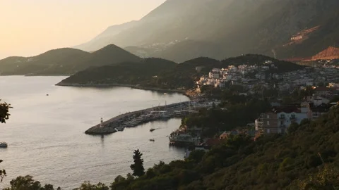 Nice cinematic view of bay at sunset or dawn of small tourist or fishing town Stock Footage 233139469