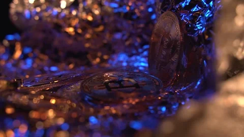 Nice close up shot of Bitcoin BTC from low angle. Crypto coins rotate on the Stock Footage 129804598