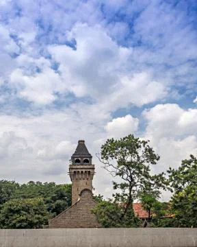 Nice clouds and blue sky over ancient dome of college of Engineering Pune. Stock Photos
