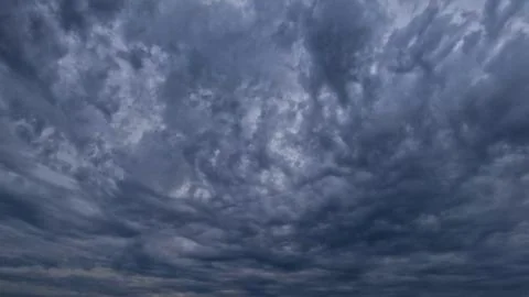 Nice cloudscape of sky with heavy rain or snow clouds background 写真素材