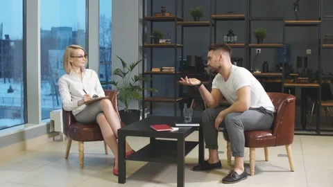 Nice conversation between patient and psychologist Stock Footage 125490984