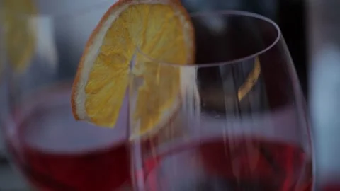 Nice couple cheering with a glass of red wine and celebrating their romantic Видео 142877253